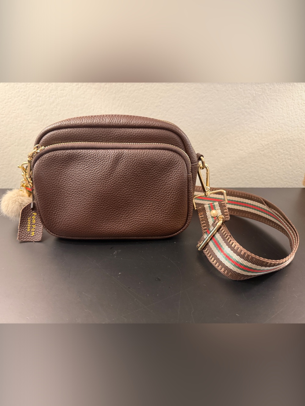 Pom Pom London brown Crossbody Camera Bag with Striped Strap